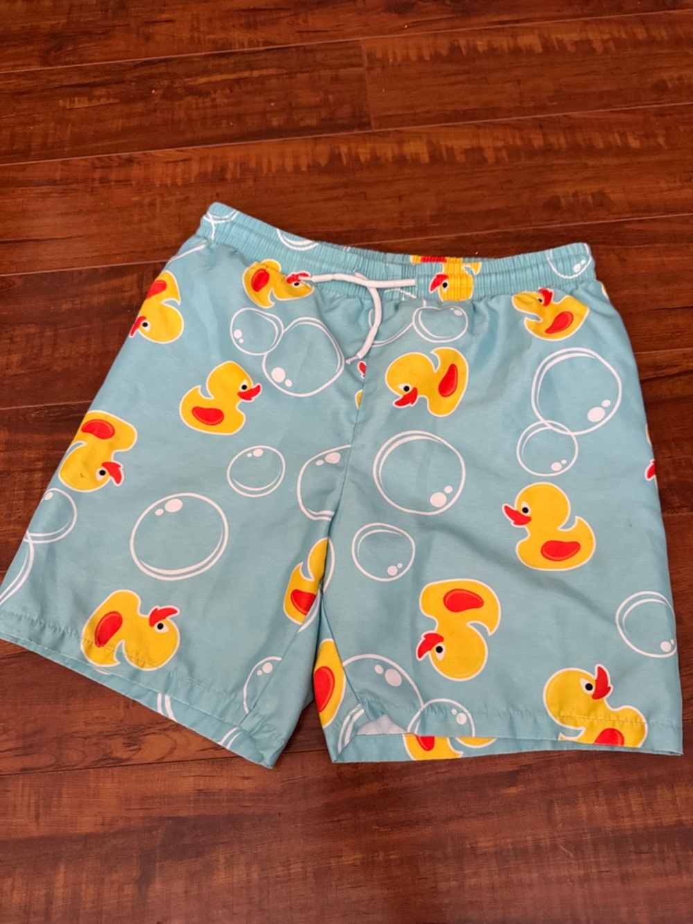 Kids Light Blue Duck Print Swim Trunks with Yellow Duck Motif